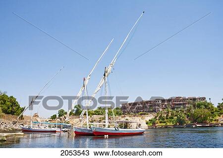Feluccas On The Nile River, Aswan, Egypt View Large Photo Image Stock Image - Feluccas On The Nile River, Aswan, Egypt. Fotosearch