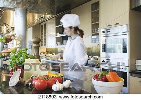 Female Chef In Kitchen; Toronto Ontario Canada View Large Photo Image Stock Image - Female Chef In Kitchen; Toronto Ontario Canada. Fotosearch