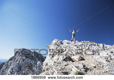 Stock Photo - Female Hiker At The Top Of Turtle Mountain, Alberta, Canada. Fotosearch