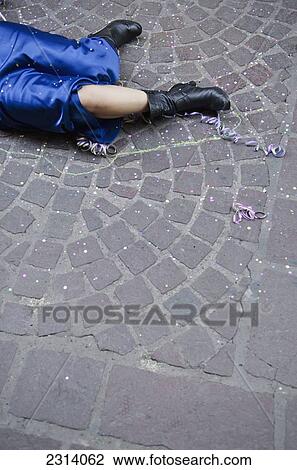 Female legs covered with party ribbons and confetti on cobblestone street; Guanajuato, Guanajuato, Mexico View Large Photo Image Stock Image - Female legs covered with party ribbons and confetti on cobblestone street; Guanajuato, Guanajuato, Mexico. Fotosearch