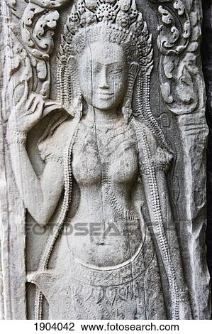 Stock Image - Female Representation Carved On Wall Of Bayon Temple, Angkor, Siem Reap, Cambodia. Fotosearch