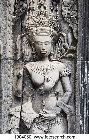 Stock Image - Female Representation Carved On Wall Of Bayon Temple, Angkor, Siem Reap, Cambodia. Fotosearch