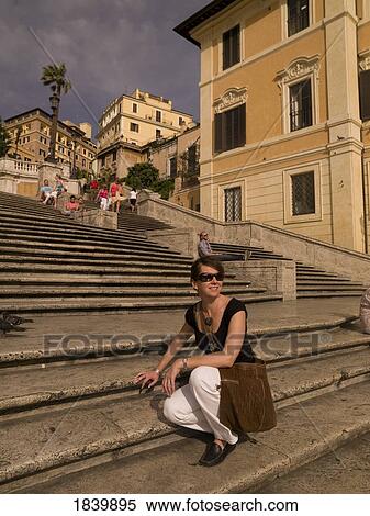 Female Tourist Sitting N The Step On Spanish Square And Smiling; Rome, Italy View Large Photo Image Stock Photography - Female Tourist Sitting N The Step On Spanish Square And Smiling; Rome, Italy. Fotosearch