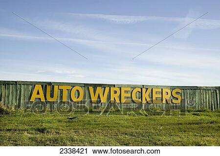 Stock Image - Fence Of Auto Wrecker Junkyard; Alberta, Canada. Fotosearch