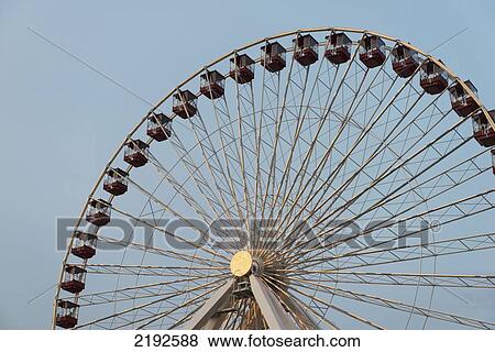 Stock Photo - Ferris Wheel Against A Blue Sky; Chicago Illinois United States Of America. Fotosearch
