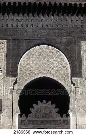 Fes, Morocco. Intricate Stucco And Wood Carving In The Bounania Medresa, A Koranic School And Mosque. Doug Mckinlay/Axiom View Large Photo Image Stock Photo - Fes, Morocco. Intricate Stucco And Wood Carving In The Bounania Medresa, A Koranic School And Mosque. Doug Mckinlay/Axiom. Fotosearch