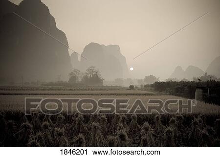 Stock Image - Field In Mountain Area, Toned Image. Fotosearch
