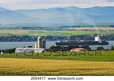 Stock Photo - Fields, Farm And St. Lawrence River, Saint Michel De Bellechasse, Chaudiere Appalaches Region, Quebec.. Fotosearch