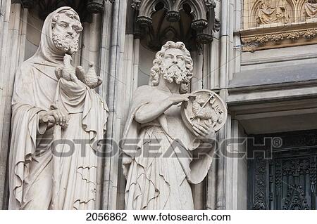 Stock Image - Figures Carved In Stone At The Main Entrance Cologne Cathedral, Cologne, North Rhine-Westphalia, Germany. Fotosearch