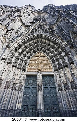 Stock Photo - Figures Carved In Stone At The Main Entrance To The Cologne Cathedral, Cologne, North Rhine-Westphalia, Germany. Fotosearch
