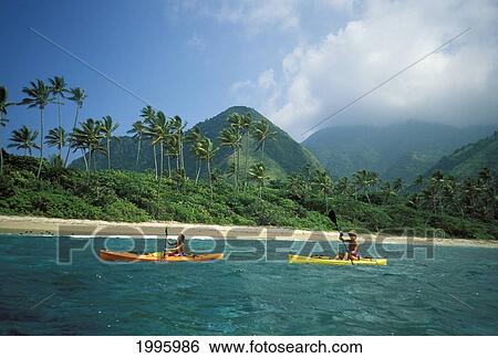 Fiji, Kadavu Islands, 2 Women Kayaking In Shallow Water Along Coastline. View Large Photo Image Stock Photograph - Fiji, Kadavu Islands, 2 Women Kayaking In Shallow Water Along Coastline.. Fotosearch