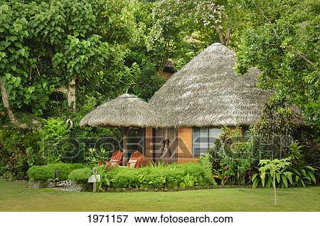 Stock Photo - Fiji, Matangi Private Island Resort, Bure Guest Lodging. For Editorial Use Only.. Fotosearch