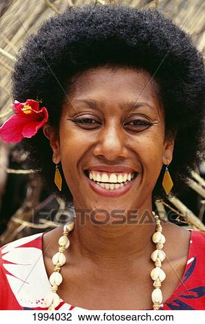 Stock Image - Fiji, Portrait Of A Smiling Fijian Woman. Fotosearch