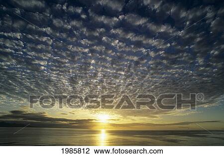 Fiji, Sun Setting Over Ocean Horizon, Beautiful Cloud Formations. View Large Photo Image Stock Image - Fiji, Sun Setting Over Ocean Horizon, Beautiful Cloud Formations.. Fotosearch