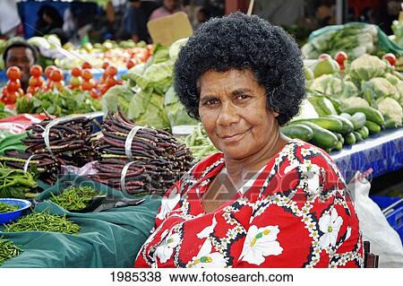 Fiji, Viti Levu, Sigatoka, Fijian Woman Selling Produce At A Market. For Editorial Use Only. View Large Photo Image Stock Photo - Fiji, Viti Levu, Sigatoka, Fijian Woman Selling Produce At A Market. For Editorial Use Only.. Fotosearch