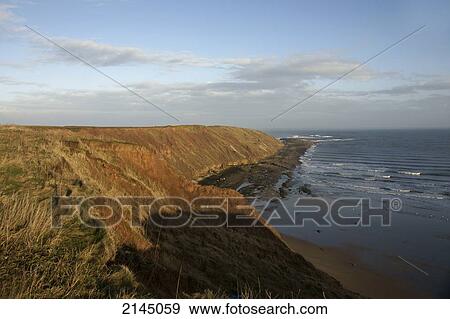 Stock Photo - Filey Brig, a distinctive feature of the Yorkshire Coast; Filey, Yorkshire, England. Fotosearch