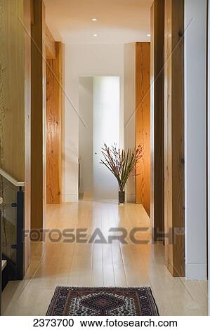 Stock Image - Fir-Trimmed Hallway In A Contemporary Home; Whistler, British Columbia, Canada. Fotosearch
