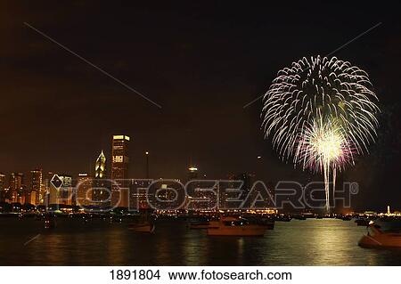 Picture - Fireworks Against Chicago Skyline At Night. Fotosearch