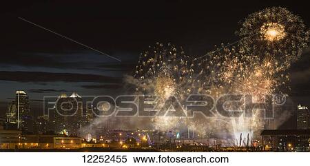 Fireworks in front of modern city skyline; Calgary, Alberta, Canada View Large Photo Image Stock Photography - Fireworks in front of modern city skyline; Calgary, Alberta, Canada. Fotosearch