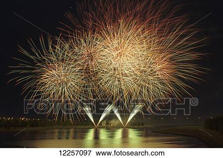 Fireworks reflecting on a lake; Calgary, Alberta, Canada View Large Photo Image Stock Photo - Fireworks reflecting on a lake; Calgary, Alberta, Canada. Fotosearch