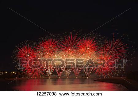 Fireworks reflecting on a lake; Calgary, Alberta, Canada View Large Photo Image Stock Photo - Fireworks reflecting on a lake; Calgary, Alberta, Canada. Fotosearch