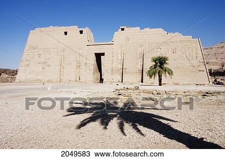 Stock Image - First Pylon Of The Mortuary Temple Of Ramses Iii, Medinat Habu, Luxor, Qina, Egypt. Fotosearch