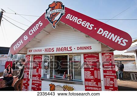 Stock Image - Fish And Chips Kiosk Facade; West Bay, Jurassic Coast, Dorset, England. Fotosearch