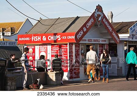 Fish And Chips Kiosk; West Bay, Jurassic Coast, Dorset, England View Large Photo Image Stock Photograph - Fish And Chips Kiosk; West Bay, Jurassic Coast, Dorset, England. Fotosearch