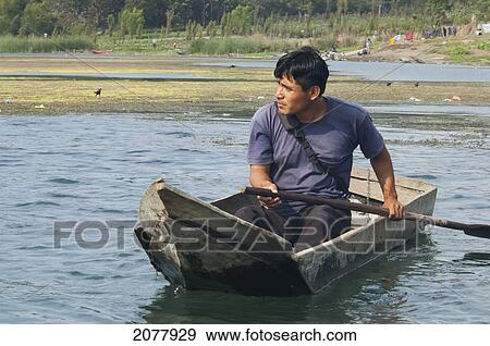 Stock Photo - Fisherman In Lake Atitl. Fotosearch