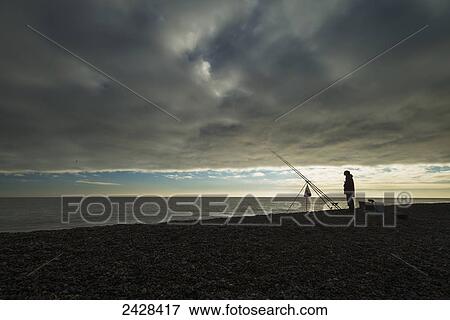 Stock Photo - Fisherman on Alderburgh beach; Aldeburgh, Suffolk, England. Fotosearch