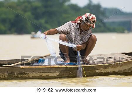 Fisherman Pulling In Fishing Net View Large Photo Image Stock Image - Fisherman Pulling In Fishing Net. Fotosearch