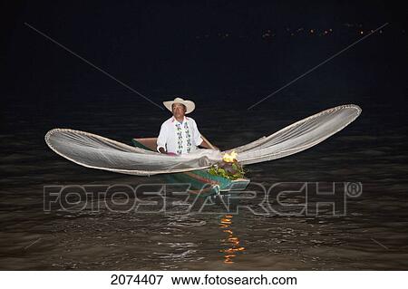 Stock Photo - Fisherman With Butterfly Nets In Lake P. Fotosearch