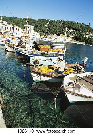 Fisherman With Fishing Boats In Harbour View Large Photo Image Stock Image - Fisherman With Fishing Boats In Harbour. Fotosearch