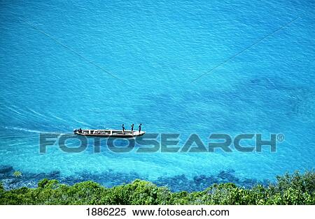 Stock Photography - Fishermen By Coastline Off Cabras Island. Fotosearch