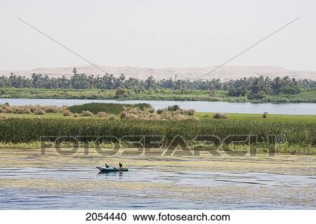 Fishermen In A Boat On The Nile River Between Aswan And Edfu, Aswan, Egypt View Large Photo Image Stock Image - Fishermen In A Boat On The Nile River Between Aswan And Edfu, Aswan, Egypt. Fotosearch