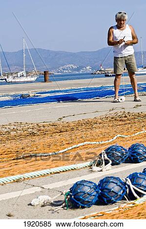 Fishermen In Port De La Selva View Large Photo Image Stock Photography - Fishermen In Port De La Selva. Fotosearch