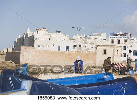 Fishermen In Port Essaouira Morocco View Large Photo Image Stock Photo - Fishermen In Port Essaouira Morocco. Fotosearch