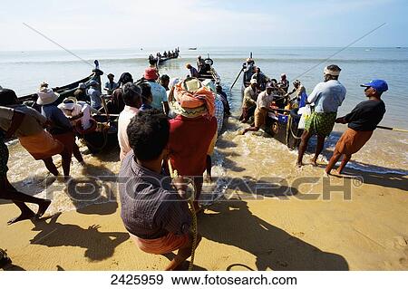 Fishermen on Bekal beach; Northern Kerala, India View Large Photo Image Stock Photo - Fishermen on Bekal beach; Northern Kerala, India. Fotosearch