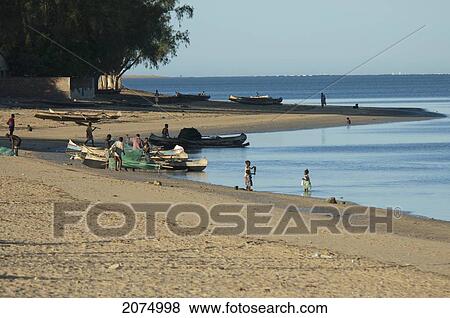 Stock Photo - Fishermen Preparing Their Boats In Mangily, Toliara Province, Madagascar. Fotosearch