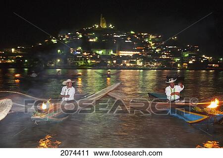Fishermen With Butterfly Nets In Lake P View Large Photo Image Stock Image - Fishermen With Butterfly Nets In Lake P. Fotosearch