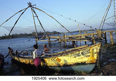 Stock Photograph - Fishermen With Painted Boat &Chinese Fishing Nets, Fort Cochin. Fotosearch