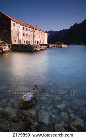 Stock Photo - Fishermens' Cottages At Dawn, Kotor Bay Monte. Tif. Fotosearch
