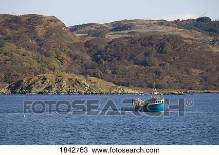 Stock Image - Fishing Boat And Landscape. Fotosearch