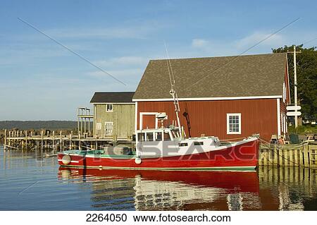 Stock Image - Fishing Boat Moored In Dock; Brier Island, Nova Scotia, Canada. Fotosearch