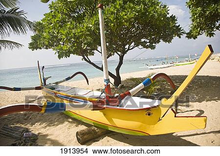 Picture - Fishing Boat On Perhatian Beach. Fotosearch