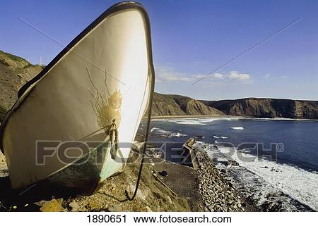 Stock Image - Fishing Boat On Shore Of Arrifana. Fotosearch