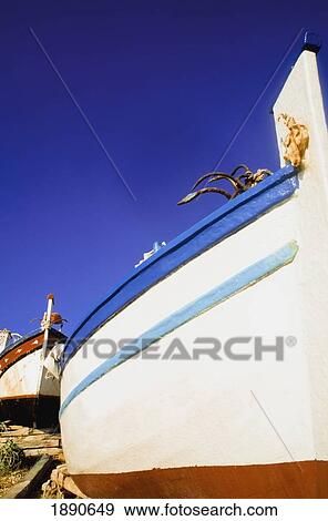 Stock Photo - Fishing Boat On Shore Of Oura. Fotosearch