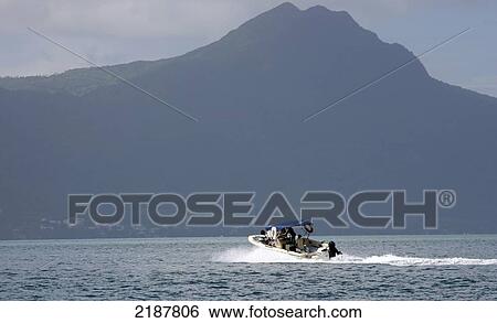 Stock Photograph - Fishing Boat On The Indian Ocean Mauritius. Fotosearch