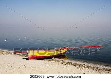 Fishing Boat On The Shores Of Lake Qarun, El Fayoum, Egypt View Large Photo Image Stock Photo - Fishing Boat On The Shores Of Lake Qarun, El Fayoum, Egypt. Fotosearch