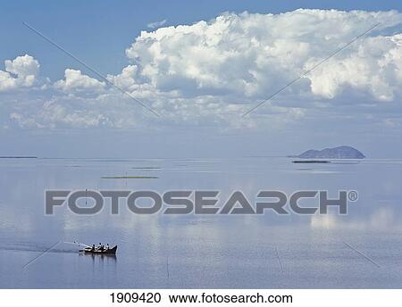 Fishing Boat Returning To Chisi Island In Lake Chilwa, Malawi View Large Photo Image Stock Image - Fishing Boat Returning To Chisi Island In Lake Chilwa, Malawi. Fotosearch